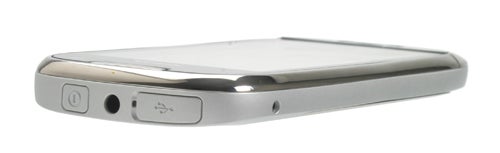 Side view of a Nokia C7 smartphone on white background.