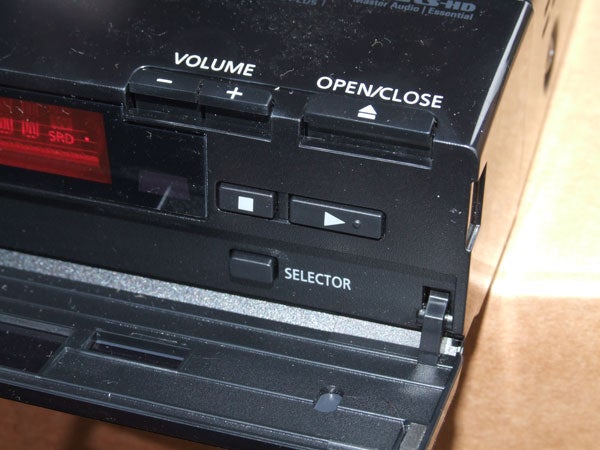 Close-up of Panasonic SC-BT735 home cinema system controls.