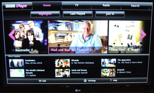 Smart TV screen displaying BBC iPlayer interface with show selections.