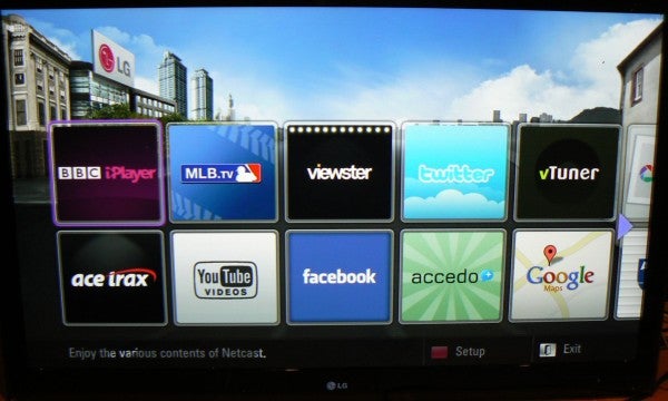 Smart TV screen displaying various online TV service apps.