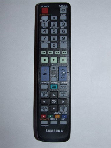 Samsung HT-C6730W system remote control on white background.