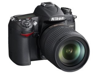 Nikon D7000 DSLR camera with lens attached.