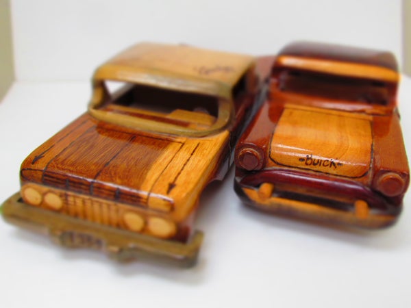 Wooden car models with shallow depth of field.