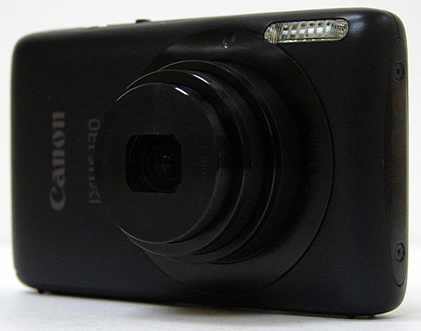 Black Canon IXUS 130 digital camera on white background.