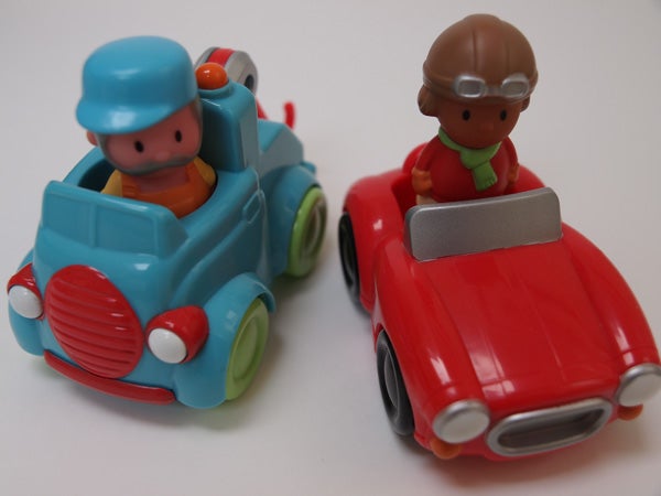 Two toy cars with figures on a white background
