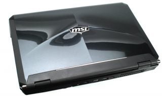 MSI GT680 gaming laptop closed on a white background.