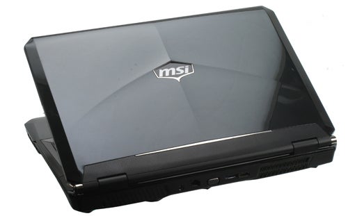 MSI GT680 gaming laptop closed on white background.