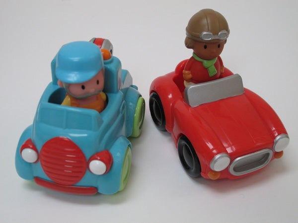 Two toy cars with cartoonish figures inside.