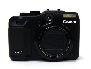 Canon PowerShot G12 camera on white background.