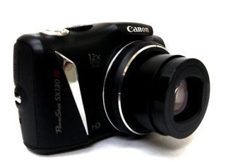 Canon PowerShot SX130 IS camera with extended zoom lens.
