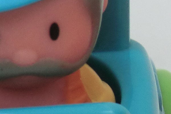 Close-up of a toy figure in soft focus.