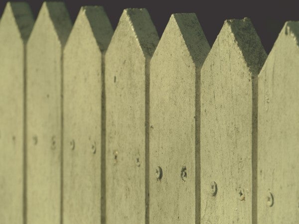 Close-up of a wooden picket fence