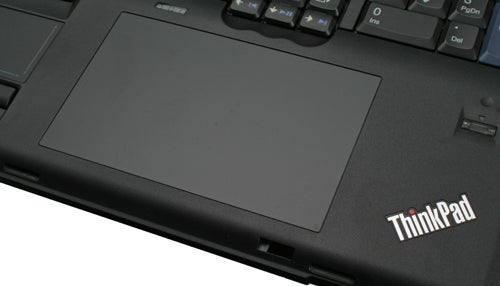 Close-up of Lenovo ThinkPad W701ds trackpad and keyboard detail.