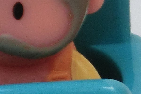 Close-up of a colorful, toy figure.