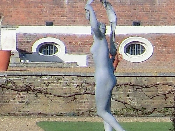 Blurred image of a statue captured with low-resolution camera.