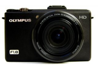 Olympus XZ-1 digital camera on white background.
