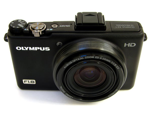 Olympus XZ-1 digital camera on a white background.