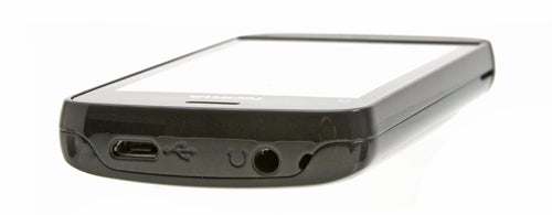 Close-up of Nokia C5-03 smartphone showing charging port and buttons.