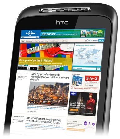 HTC Mozart smartphone displaying colorful webpage on screen.