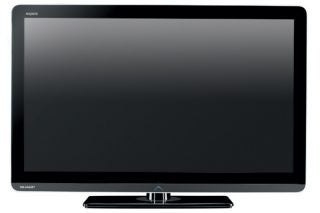 Sharp Aquos LC-37LE320E LED television on white background.