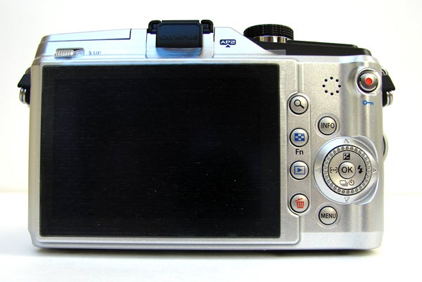 Olympus E-PL2 camera back view showing display and controls.