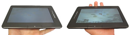 Archos 70b eReader displayed in two hands from different angles.