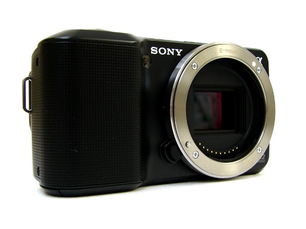Sony Alpha NEX-3 camera without lens on white background.
