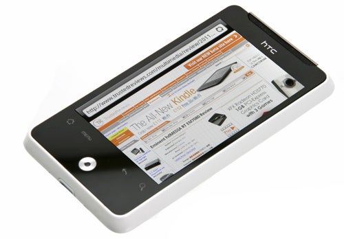 HTC Gratia smartphone displaying a webpage on its screen.