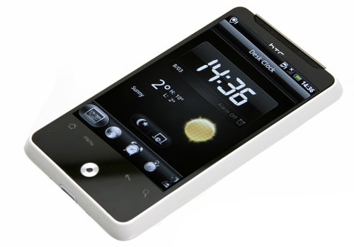 HTC Gratia smartphone displaying clock widget on screen.