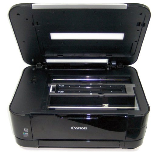 Canon PIXMA MG8150 printer with open scanning lid.