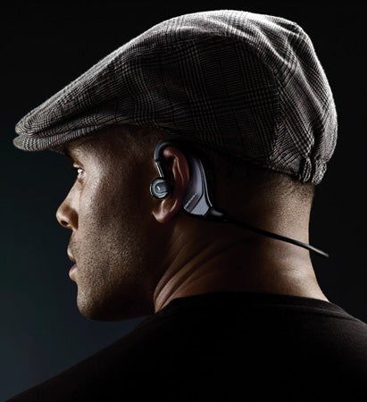 Man wearing Plantronics BackBeat 903+ wireless headphones.