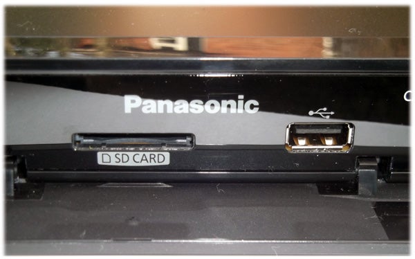 Close-up of Panasonic DMP-BDT110 Blu-ray player's SD card slot.