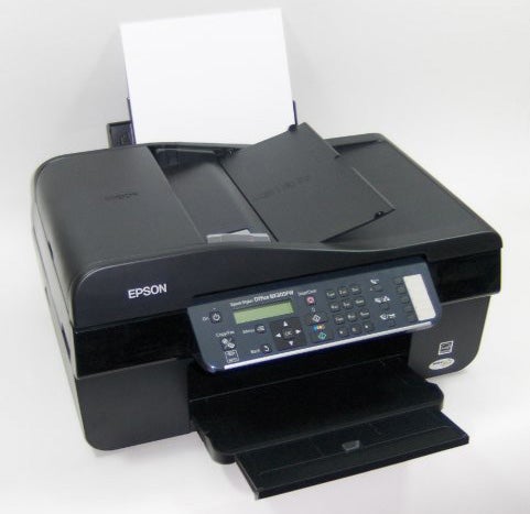 Epson Stylus Office BX305FW multifunction printer with paper loaded.