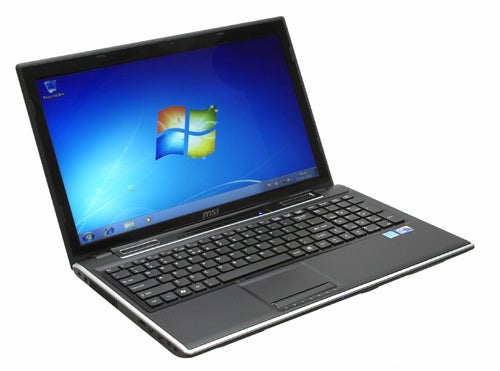 MSI FX600 laptop with open lid displaying Windows desktop.