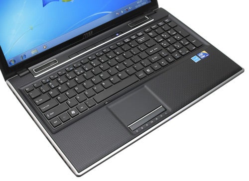 MSI FX600 laptop with keyboard and screen visible.