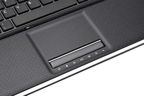 Close-up of MSI FX600 laptop's touchpad and keyboard area.