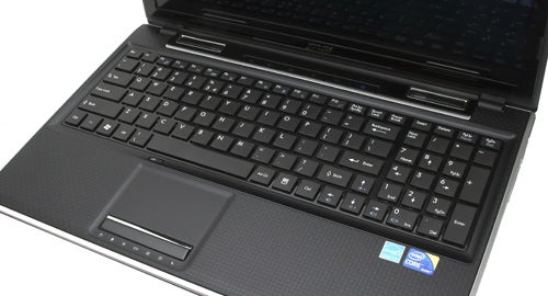 MSI FX600 laptop open showing keyboard and touchpad.