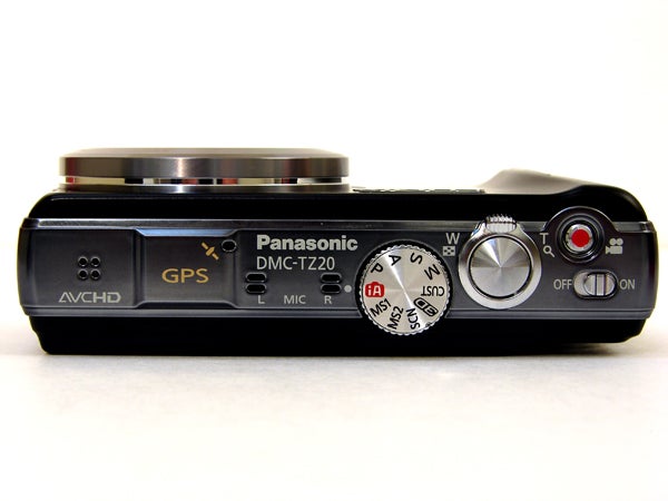 Panasonic Lumix DMC-TZ20 camera top view showing buttons and dials.