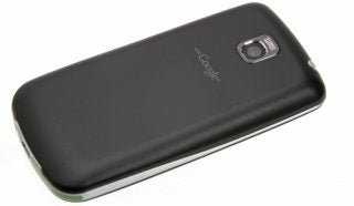 LG Optimus One P500 smartphone lying on surface.