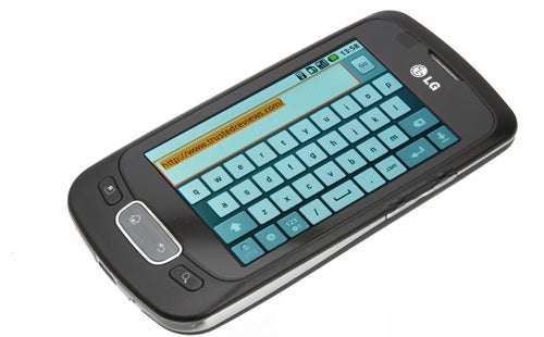 LG Optimus One P500 smartphone with on-screen keyboard displayed.