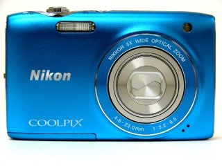 Blue Nikon Coolpix S3100 digital camera.