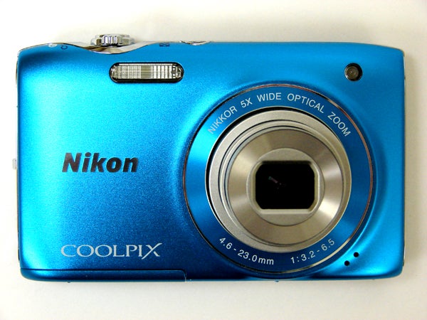 Blue Nikon Coolpix S3100 digital camera on white background.