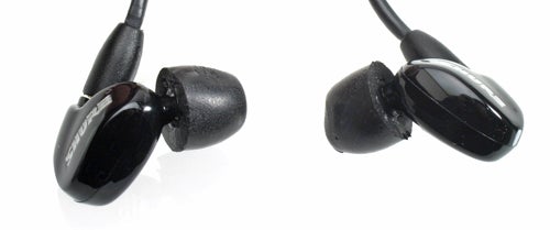 Shure SE315 sound-isolating earphones on white background.