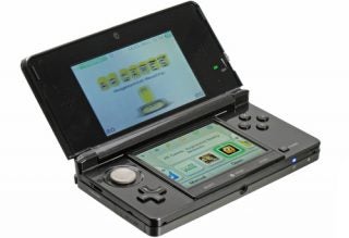 Nintendo 3DS handheld console open with screen displaying menu.