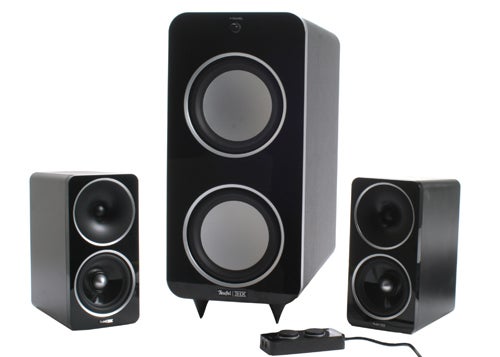 Teufel Concept D 500 THX speakers with a remote control.