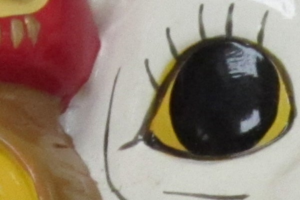 Close-up of a colorful cartoon character's eye.