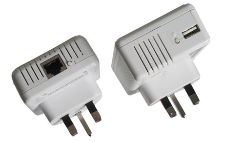 Devolo dLAN AV USB Extender adapters on white background.