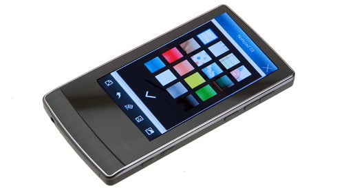 Cowon J3 portable media player on white background.