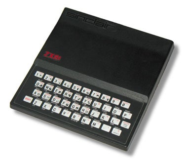 Sinclair ZX81 vintage personal computer on white background.