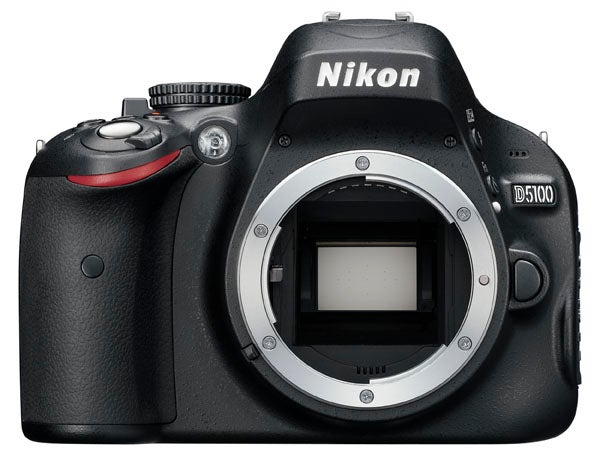 Nikon D5100 DSLR camera without lens, front view.